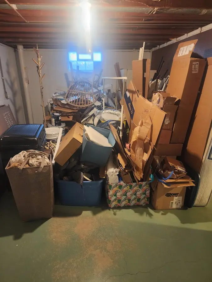 Roll-off dumpster container at job site for Yard Waste Dumpster Rental in Central